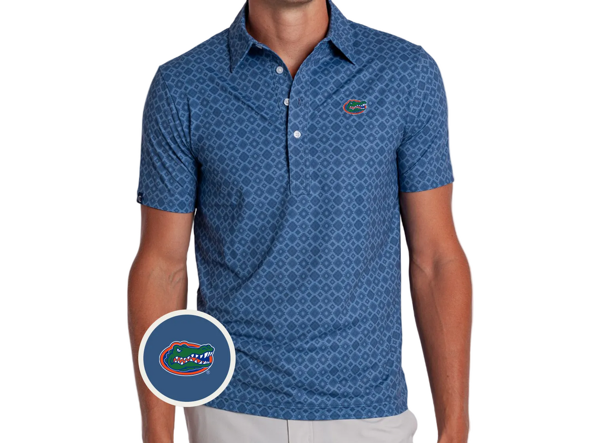A man wearing a blue short-sleeve polo shirt with a repeating geometric pattern and the Florida Gators logo on the chest. A circular inset at the bottom left shows a close-up of the Gators logo.