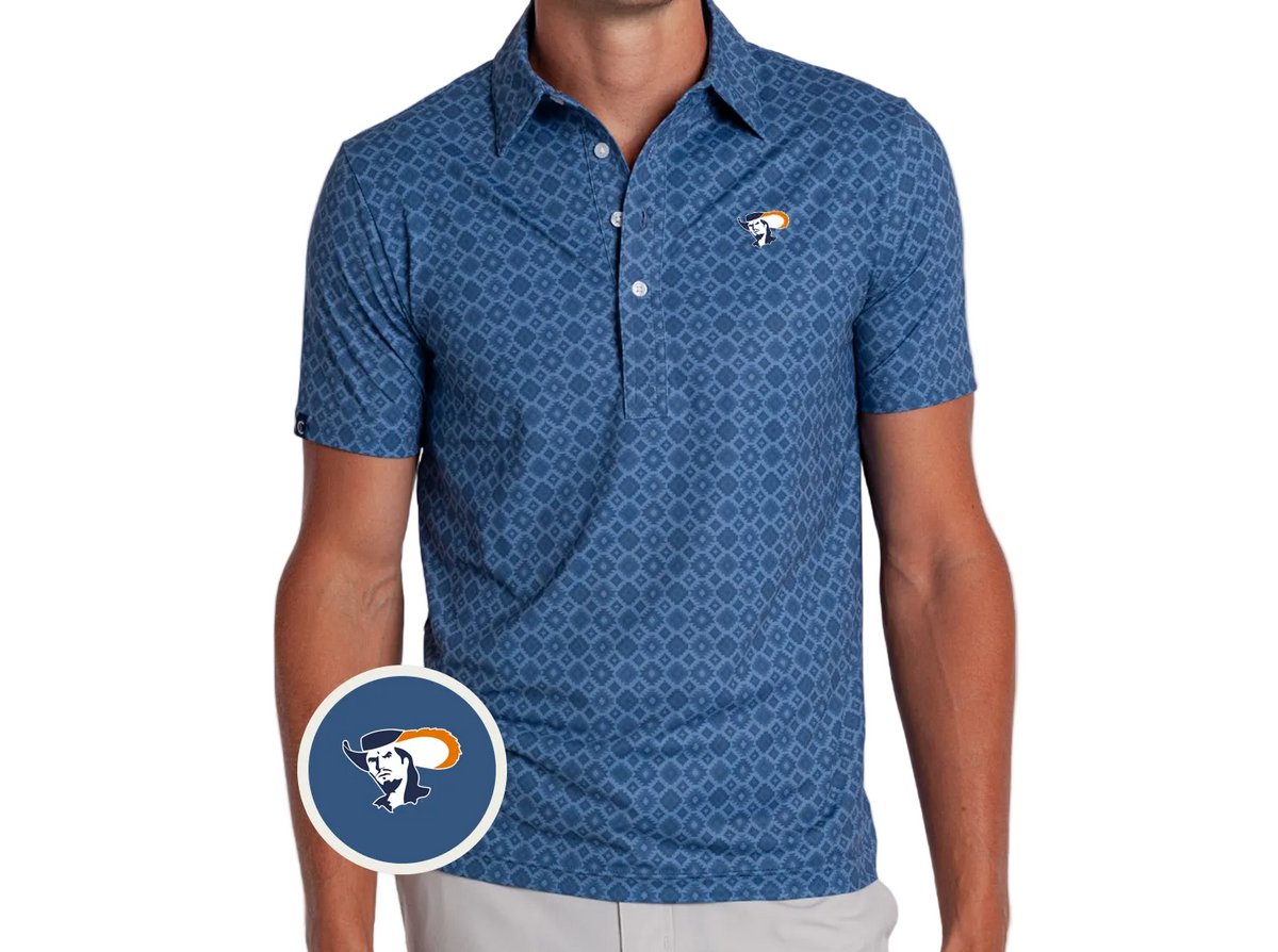 A man wearing a blue short-sleeve polo shirt with a repeating geometric pattern and a small embroidered Virginia Cavalier logo on the left chest. A circular inset shows a close-up of the Cavalier logo.