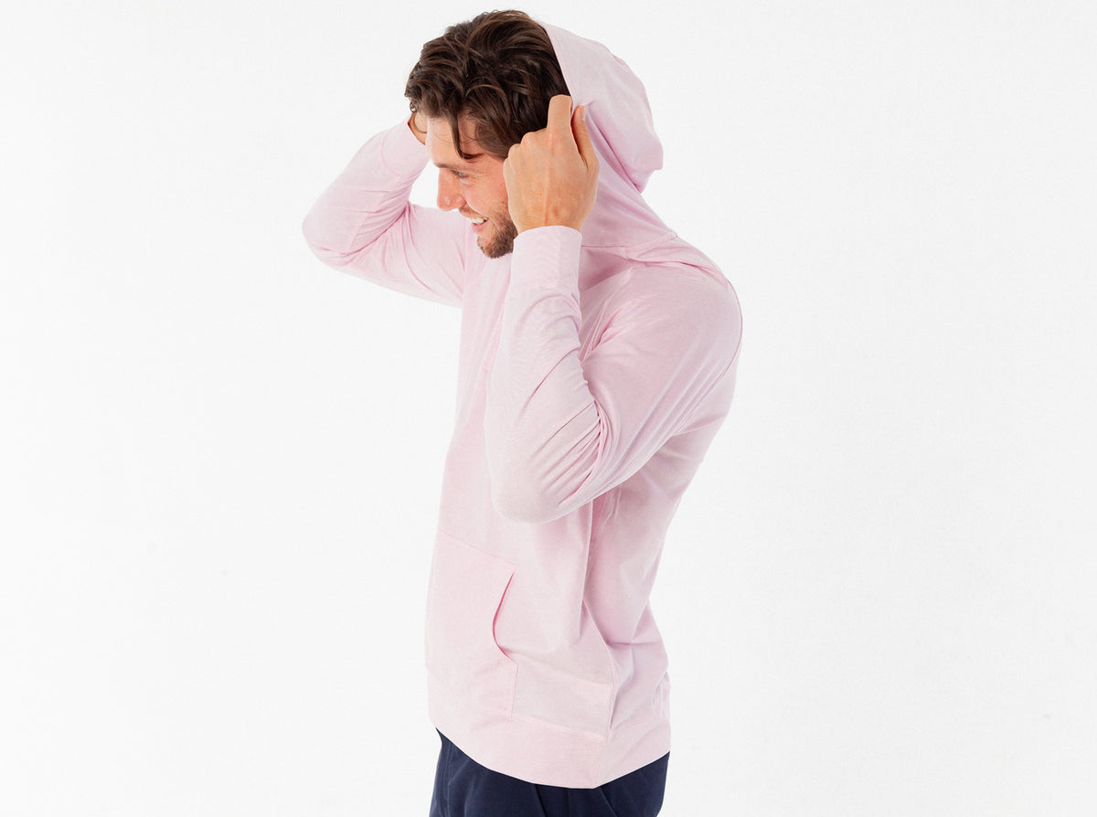Criquet Ace Performance Hoodie in Pink, studio photo