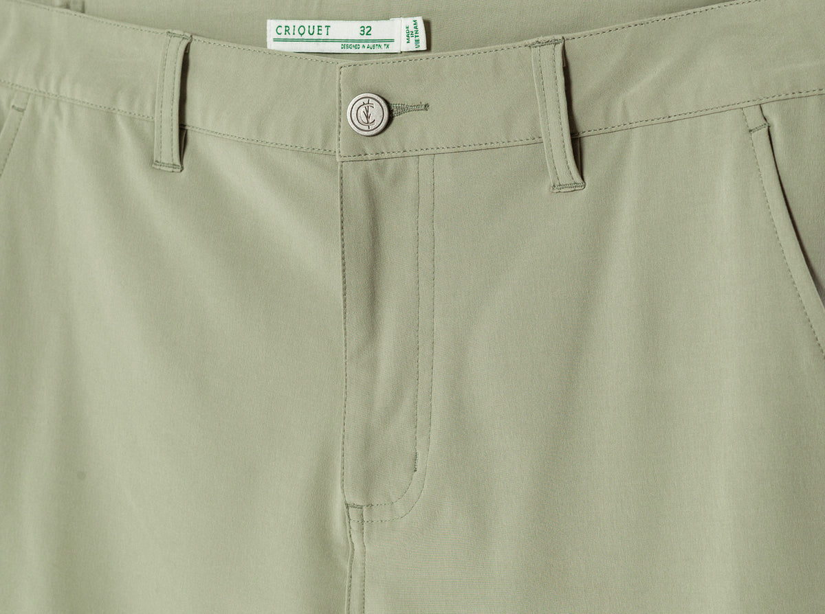 Criquet Anytime Pants in Sage, studio photo