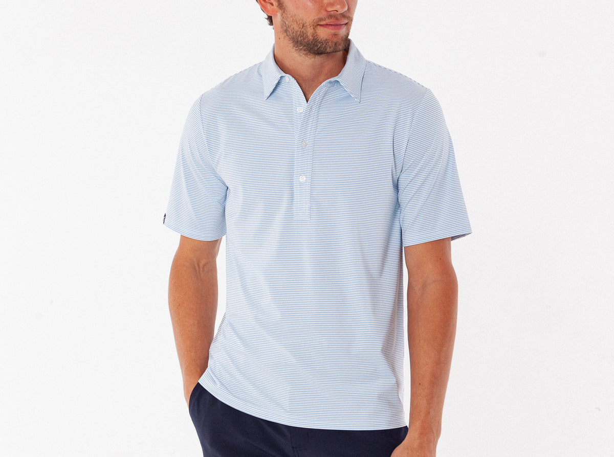 Criquet Performance Sport Range Polo in Hobby Stripe, Light Blue, studio photo