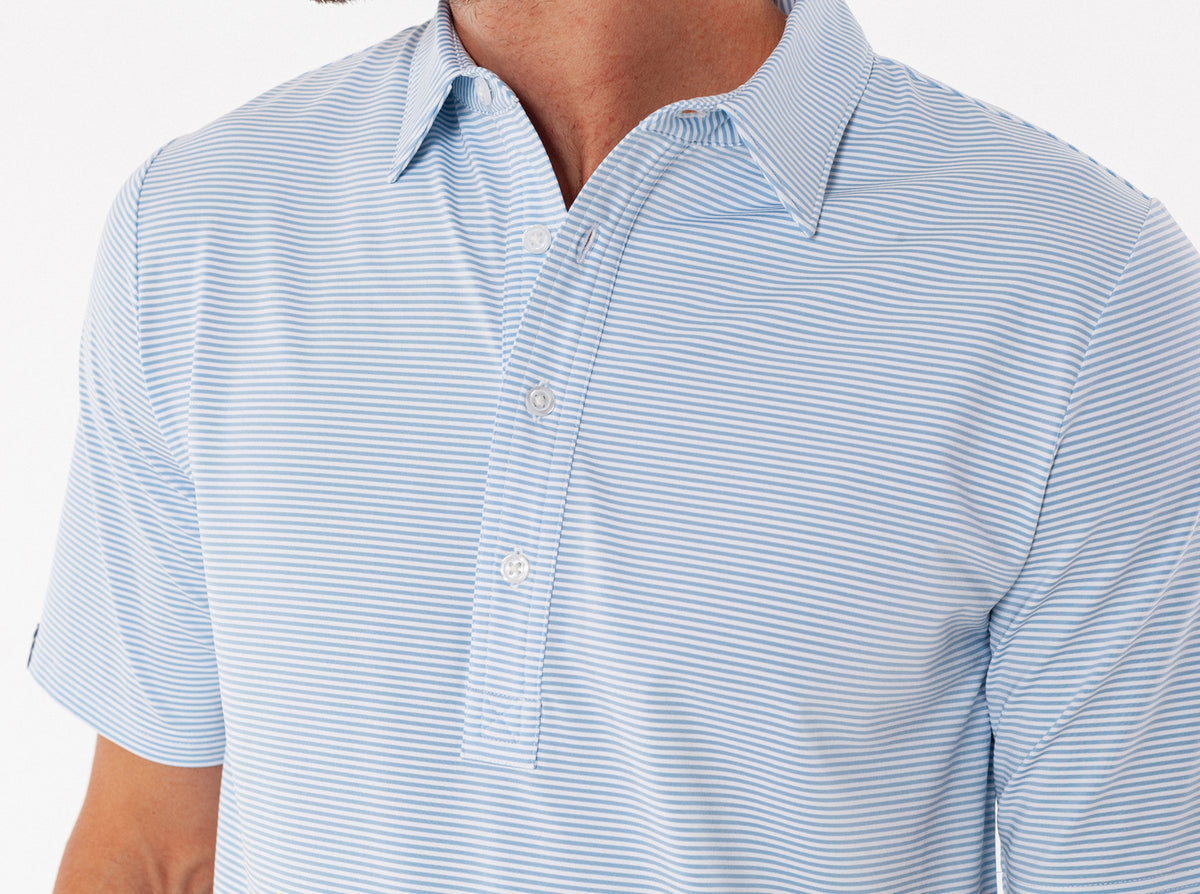 Criquet Performance Sport Range Polo in Hobby Stripe, Light Blue, studio photo