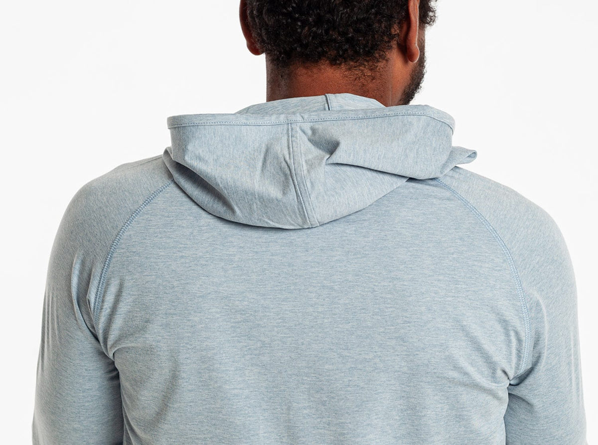 Criquet Ace Performance Hoodie in Dusty Blue, studio photo