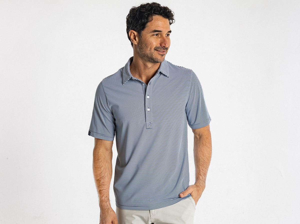 Criquet Performance Sport Range Polo in Hobby Stripe, Navy, studio photo
