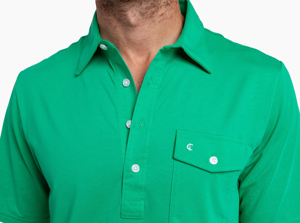 Criquet Performance Players Shirt in Golf Green, studio photo